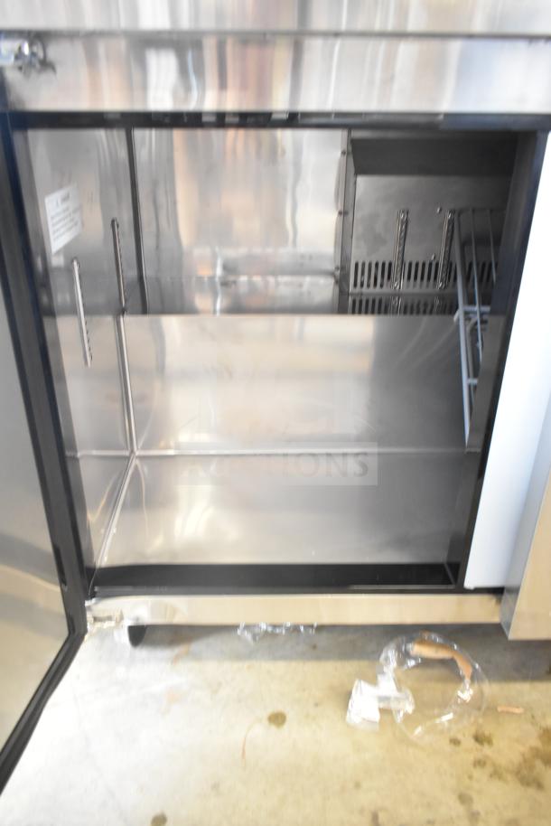 Brand new Avantco 178AU72R 3 Door Undercounter Cooler, stainless steel, minor scratches, 115V, 1 phase, interior view.