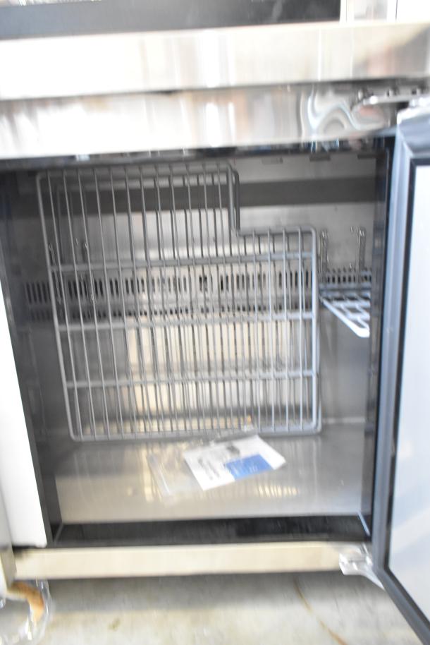 Brand new Avantco 178AU72R 3-door undercounter cooler, 115V, 1-phase. Scratch and dent model, interior view shown.