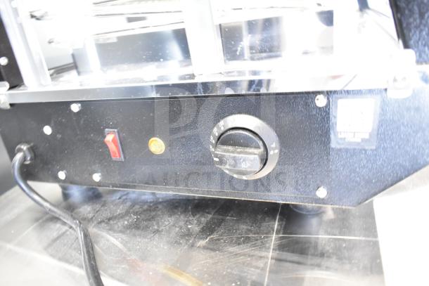 Brand new Avantco 177HDC26 countertop heated display case, 26", 3 shelves, sliding doors, missing glass panels. 120V, 1 phase.