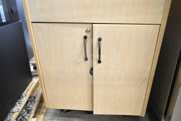 Brand new Ozark River ADSTM-AB-AB1N portable sink on commercial casters with light wood finish, minor scratches visible.