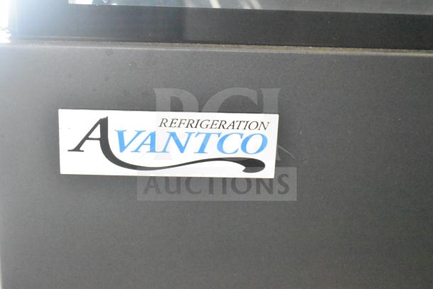 Brand new Avantco 193BCFD72B black bakery display case, 70 7/8", with LED lighting, visible Avantco label, minor scratches.