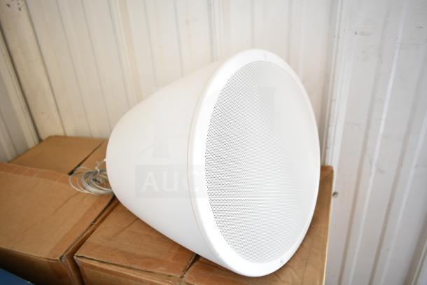 Electro-Voice EVID-P6.2W speaker, white, wall-mounted, used condition, placed on boxes.