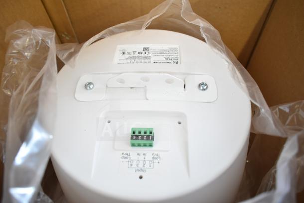 Electro-Voice EVID-P6.2W speaker in packaging, showing mounting bracket, connection terminals, and label details.