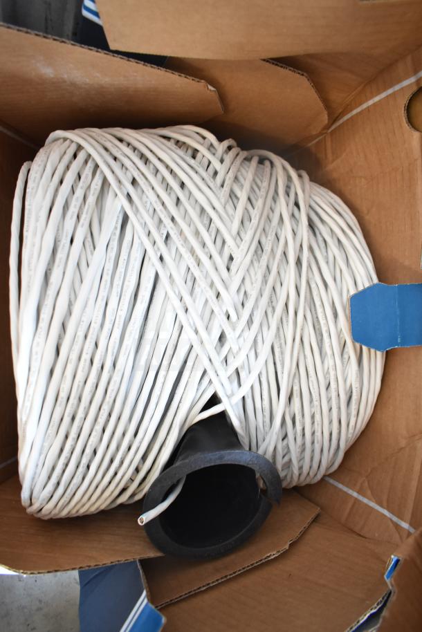 3 Paige Datacom Solutions 12/2C STR ZIP CL3 WHITE cables, coiled in box, high-quality network wiring for installations.