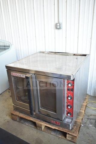 Blodgett Mark V commercial electric convection oven, stainless steel, view-through doors, thermostatic controls, on casters.