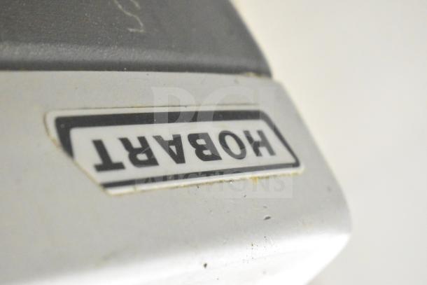 Hobart 2912 commercial meat slicer. Visible branding. 115 Volts, 1 Phase. Used condition.