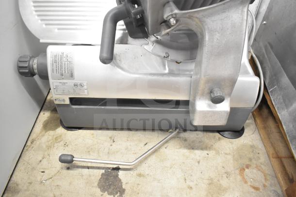 Hobart 2912 commercial meat slicer, 115V, 1 phase, stainless steel, with visible control knob and manufacturer's label.