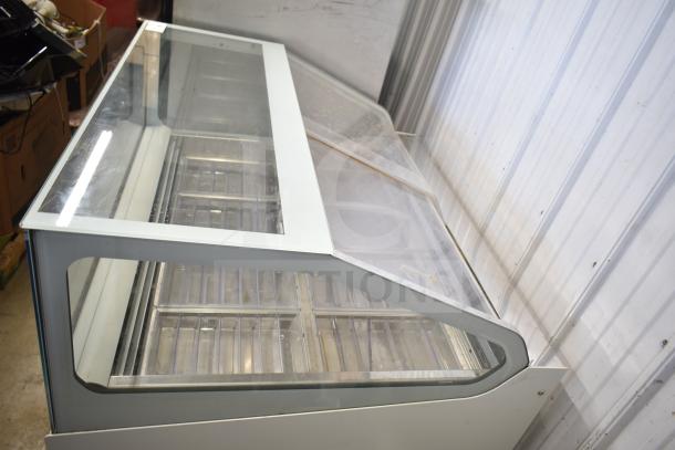 Ifi SAM80-GVBD-1125-AB gelato display case, glass front, metal frame, well-maintained, 208-220V, 1-phase power.