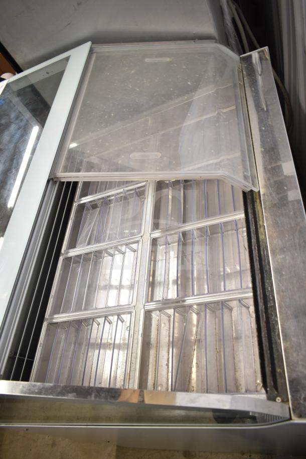 Ifi SAM80-GVBD-1125-AB commercial gelato display case, clear lids, spacious interior, 208-220V, 1 phase, good condition.