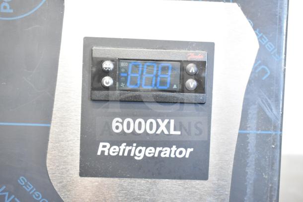 Brand new Delfield 6051XL-S two-door commercial cooler, 115V, 1 Phase, with digital display, minor scratches.