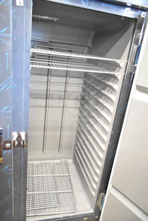 Delfield 6051XL-S 2 Door Reach In Cooler, brand new, 115V 1 Phase, commercial use, minor scratches.