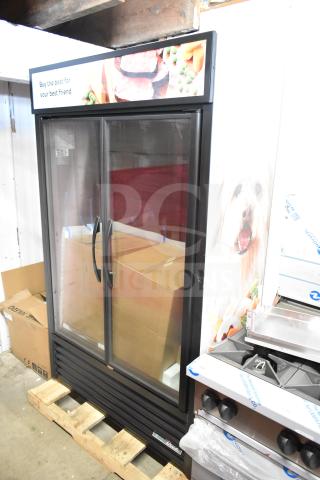 Brand new 2025 True TVM-48SL-HC commercial 2-door reach-in cooler merchandiser, 115V, 1 phase, with minor scratches and dents.