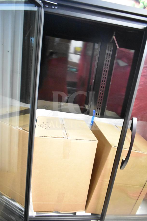 Brand new True TVM-48SL-HC 2-door cooler merchandiser, commercial, scratch and dent, 115 volts, 1 phase.