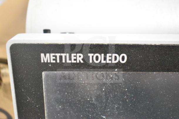 Mettler Toledo commercial countertop scale, tested and working, featuring clear display and sturdy build.