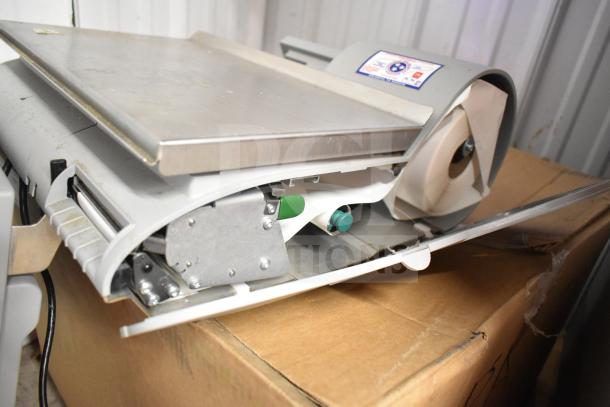 Mettler Toledo commercial countertop scale, stainless steel surface, tested and working, visible label on the side.