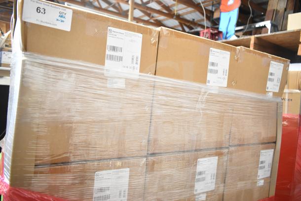 30 boxes of Electro-Voice EVID-P6.2UW speakers, new with minor damage, labeled, ready for auction in a warehouse.