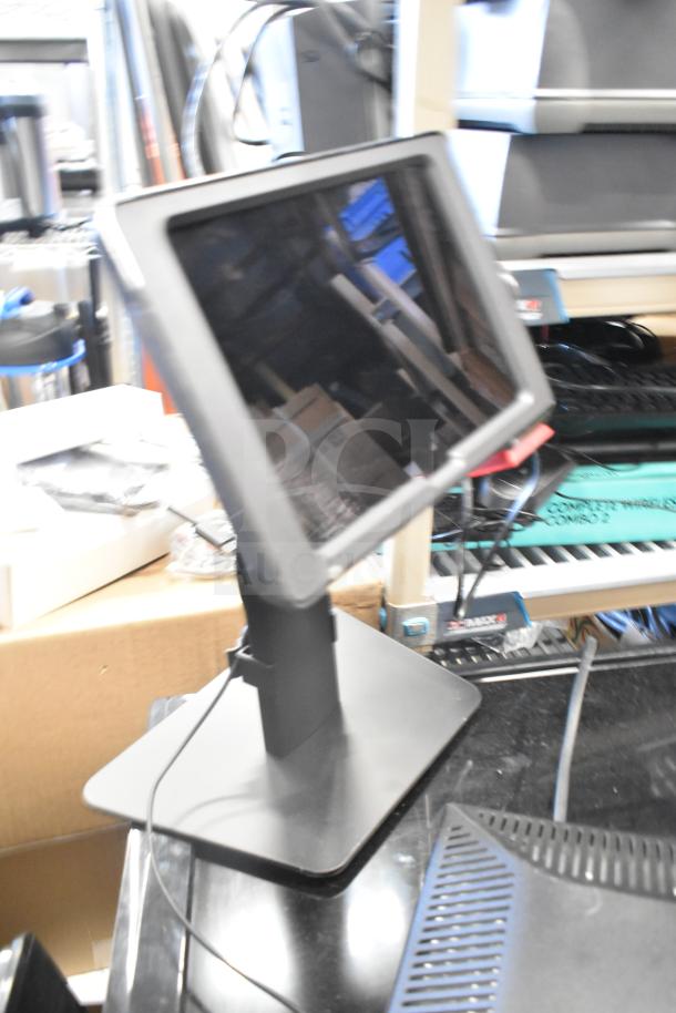 Assorted electronics lot including Onn, Dell, HP monitors in varied conditions, 27 items total; cables visible.