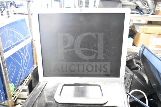 HP computer monitor model LP1710, black screen, in used condition, part of a 27-item lot including various monitors.
