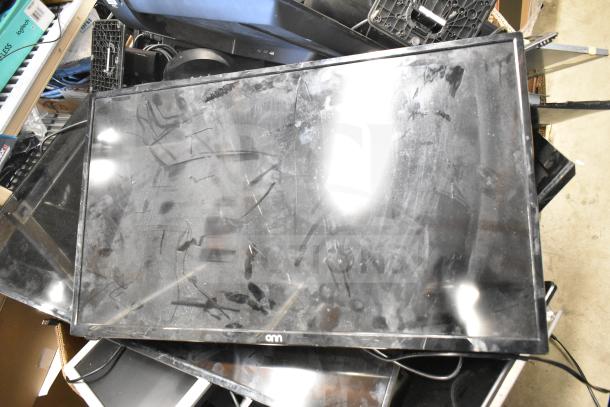 Lot of 27 computer monitors including Onn, Dell, and HP. Mixed condition, displays visible wear and dust.