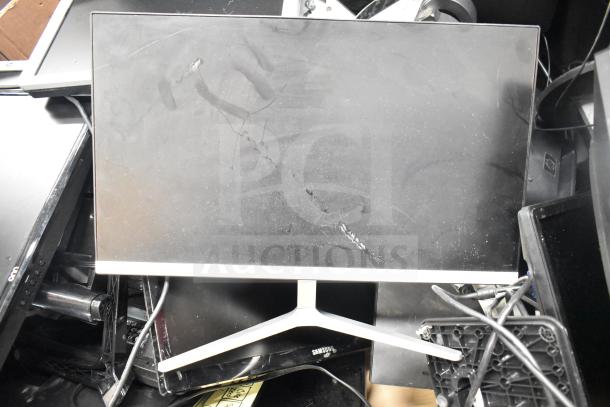 Auction lot of 27 various computer monitors including Onn, Dell, HP models, mixed conditions, visible wear and scratches.