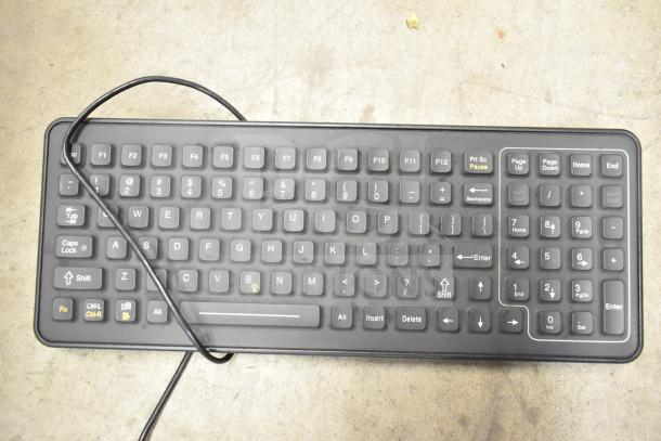 Computer keyboard in used condition with standard key layout and numeric pad; part of a lot of 26 various items.