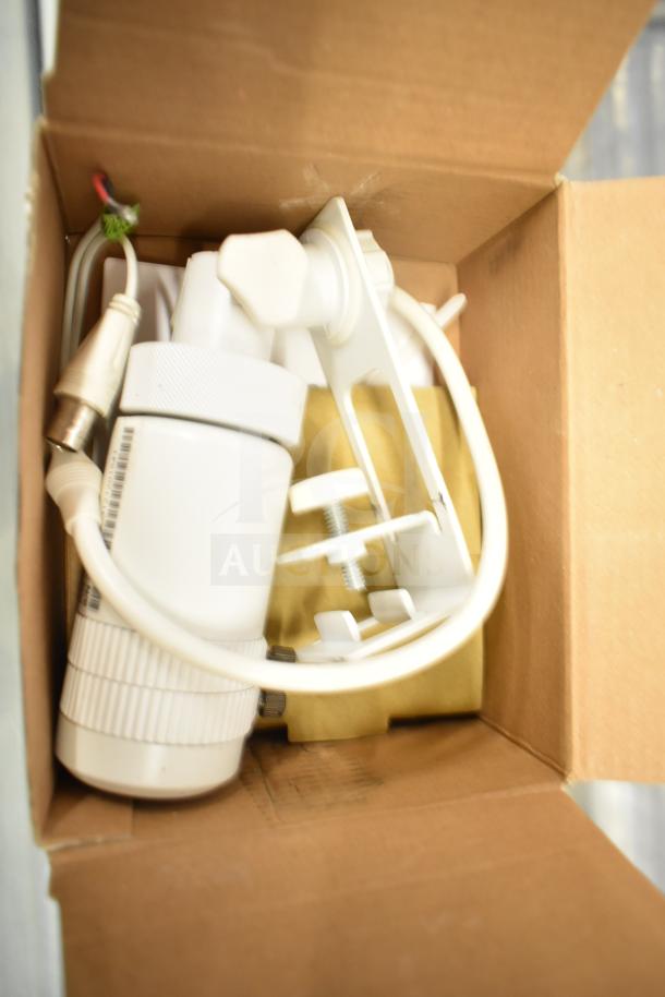 Two Wren bullet cameras in box, white color, complete with mounting hardware and cables, condition appears new.