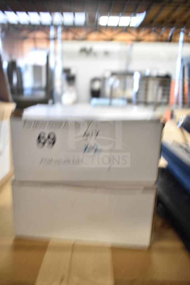 Two boxed Wren bullet cameras, unopened. Visible auction label from PCAauctions.com, item 69.