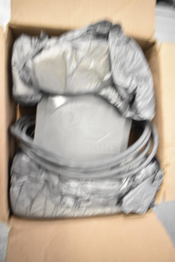 Box containing 5 items including a Sensormatic ZBSMPCPEF Compact Pad Pro, wrapped in protective packaging.