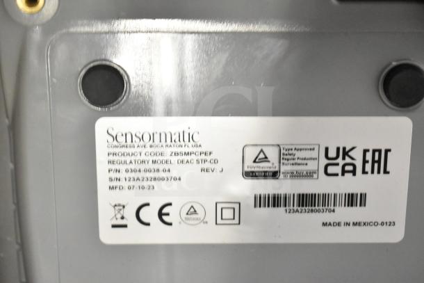 Sensormatic ZBSMPCPEF Compact Pad Pro label, including product code, regulatory model, serial number, and certifications.