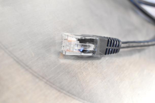 Close-up of a cable connector for the 2024 Hobart HTi-7LH4W commercial scale, tested and working.