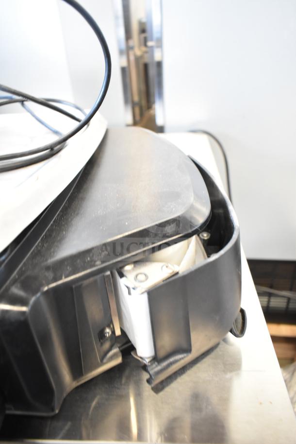 2024 Hobart HTi-7LH4W countertop food portioning scale, tested, working, visible wiring, black casing.