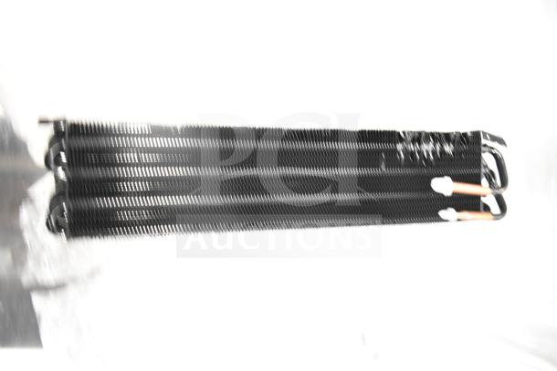 2 brand new scratch and dent items: Avantco 177PMG225 auger and evaporator coil, auctioned at double bid value.