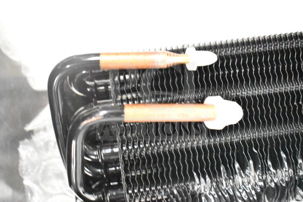 Brand new Avantco 177PMG225 evaporator coil, black with copper components, mint condition, scratch and dent sale.