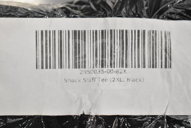 Barcode label on Shack Staff Tee package, model 2950035-00-82X, size 2XL, black; item wrapped in plastic.