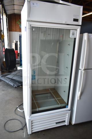 2021 True TSCI-600R-G-PH single door cooler, glass front, electric, 115V, new condition, visible interior shelving.