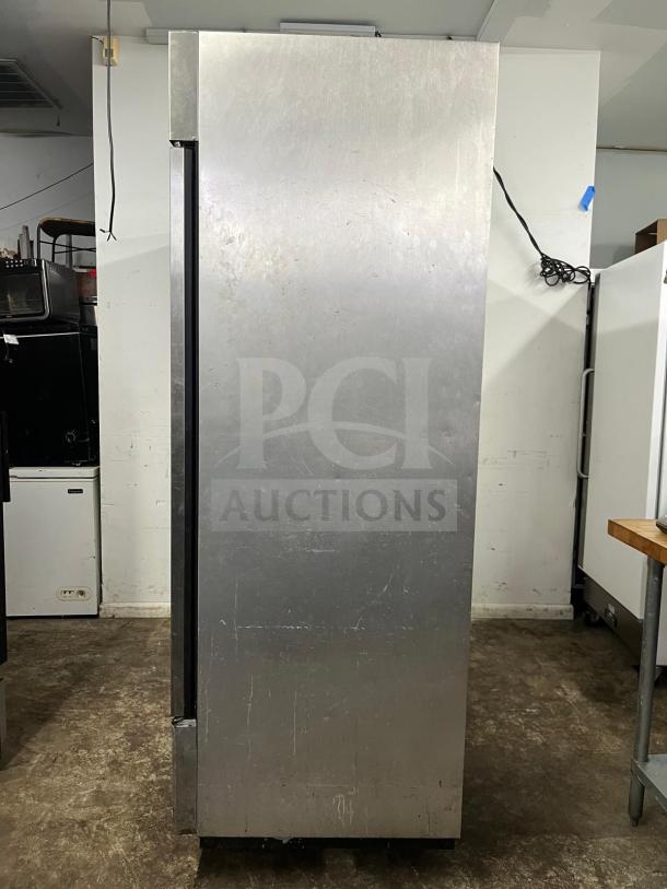 True T-72F 78" reach-in freezer with solid door, model T-72F. Stainless steel, visible wear, commercial use.