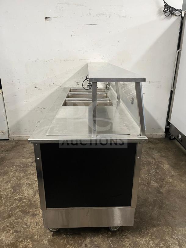 Vollrath 4-Series 36291 Food Station, stainless steel counter, 74" x 27", non-refrigerated, excellent condition.