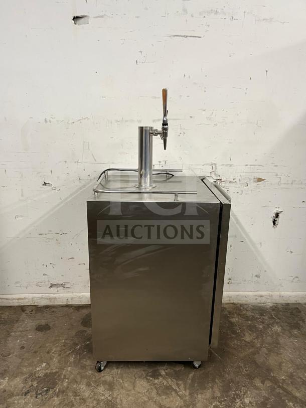Kegerator sbc695osnk outdoor beer dispenser in stainless steel, mounted on wheels with tap. Good condition, minor wear.