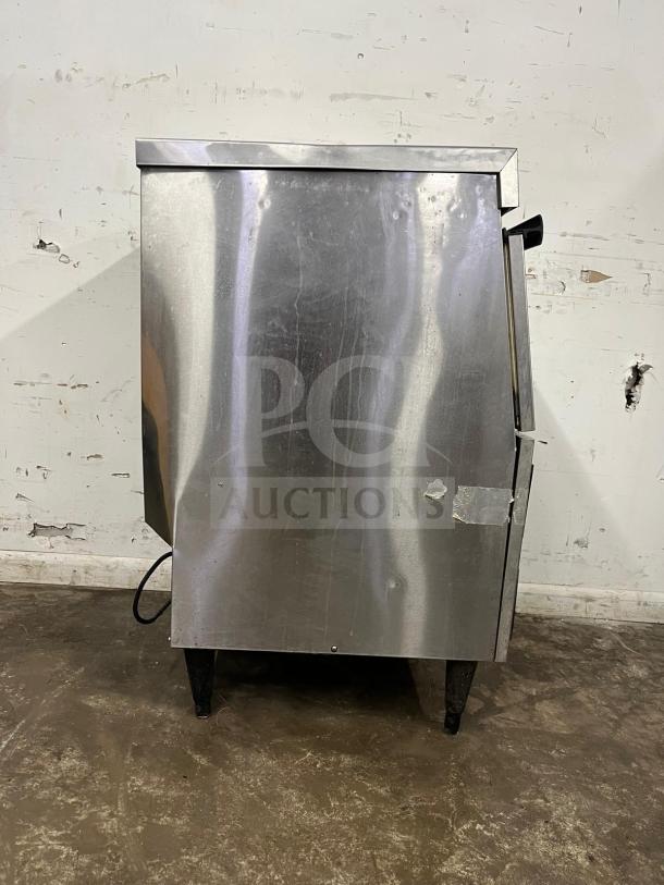 Hoshizaki 24" air-cooled cube ice machine, stainless steel finish, some surface wear, model: ice machine.