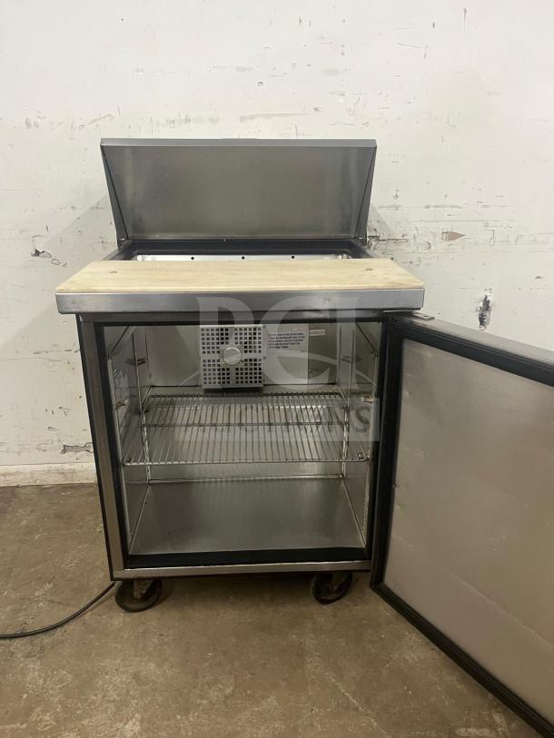 True TSSU-27-08-HC refrigerated sandwich prep table, 27 7/8", right-hinged door, good condition, stainless steel exterior.