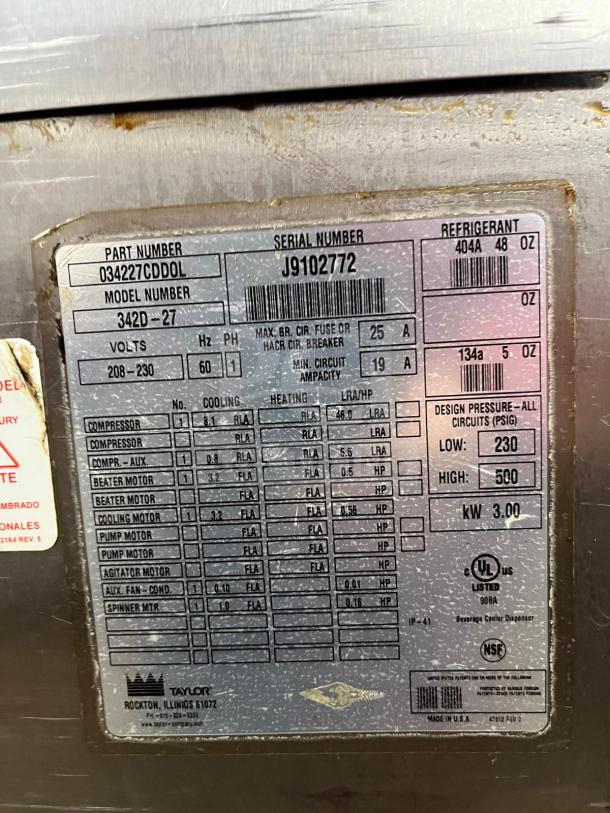 Taylor 342D Double Flavor Frozen Drink Machine label with model, serial number, voltage, and refrigerant details.