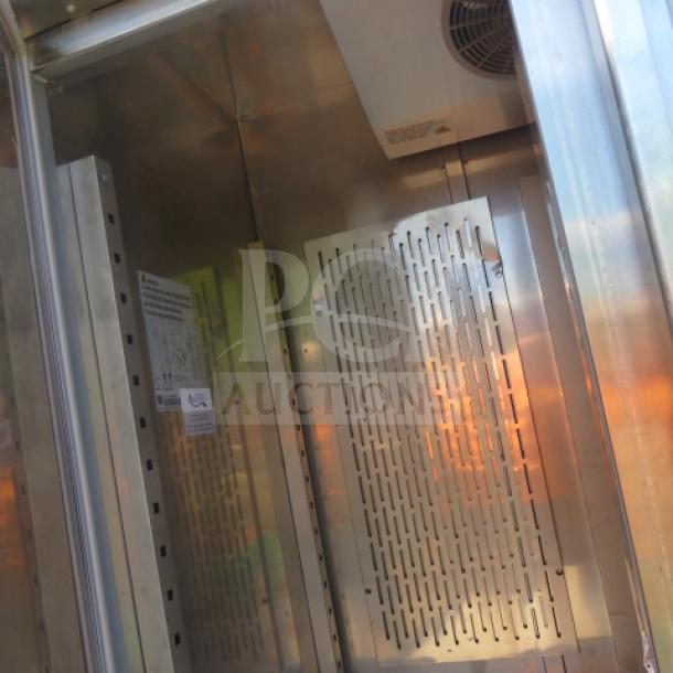 Avantco 3-door refrigerator interior with 8 racks, Model 178SS3RHC. Stainless steel finish, on casters. Dimensions: 80x32x82 inches.