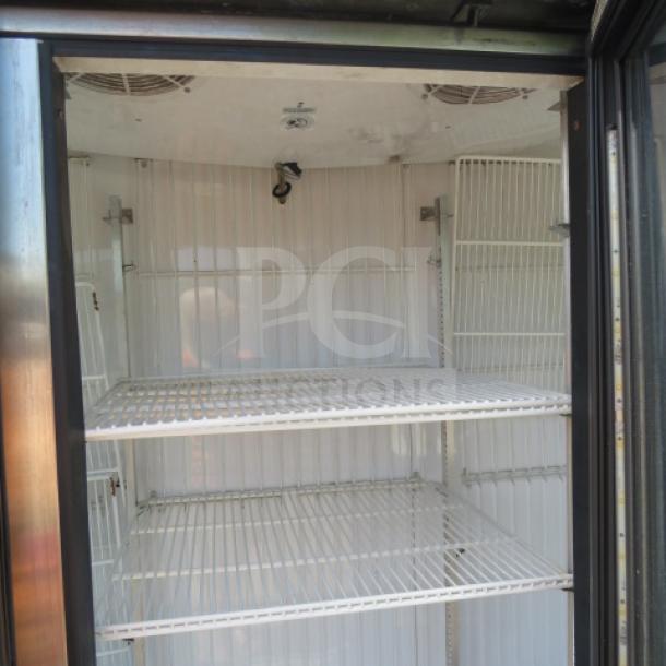True 3 Door Glass Display Freezer, model GDM-72F-HC, with 6 racks. Dimensions: 78x30x77.5 inches. 115/208-230V.