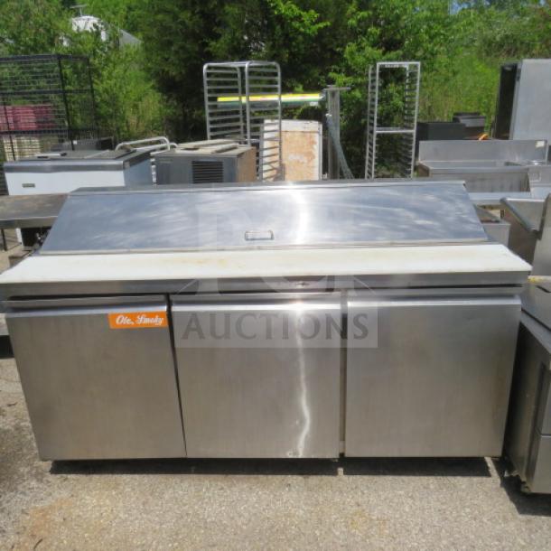 Avantco 3-door refrigerated prep table, model 178SSPT71HC, on casters. Stainless steel, 71x30x42 inches, 115V.