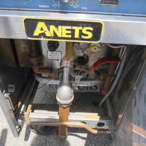 Anets Dual Natural Gas Pasta Cooker, Model GPC14, on casters. Dimensions: 31.5x31x58 inches. Appears in used condition.