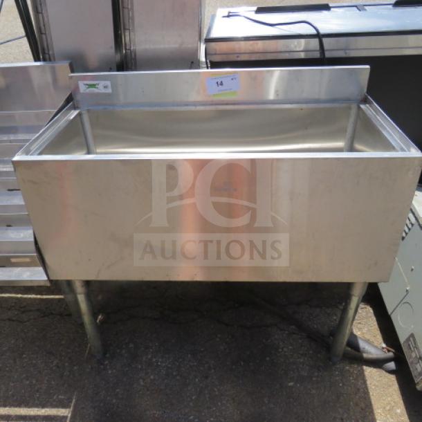 Regency stainless steel ice well, Model 600IB1836, 36x18x33 inches, industrial grade, good condition.