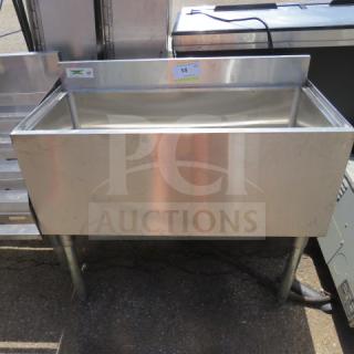 Regency stainless steel ice well, Model 600IB1836, 36x18x33 inches, industrial grade, good condition.