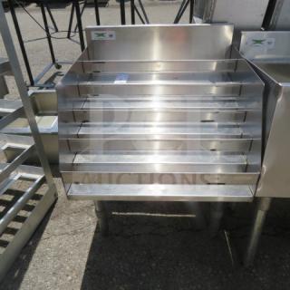 Regency stainless steel 5-tier liquor display, Model 600LDR2334, measures 24x23x32 inches, in good condition.