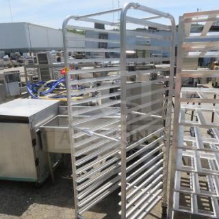 Regency Aluminum Speed Rack on casters, Model 109RACKECON, 21x26x69 inches, multiple shelves, outdoor setting.