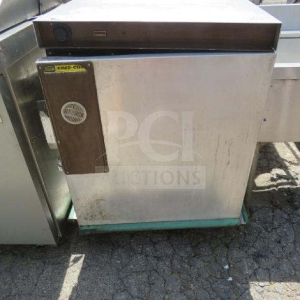 Crescor Heat and Hold oven on casters, stainless steel, 26x30x36 inches. Features front control panel and Cres-Cor label.